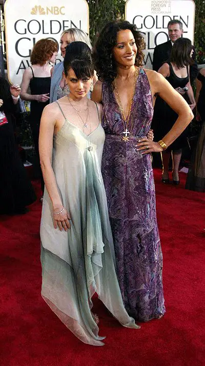 Mia Kirshner and Jennifer Beals attending Golden Globe Awards
