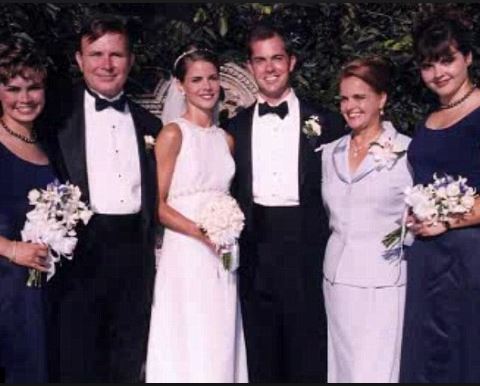 Marriage picture of Natalie Morales and Joe Rhodes.