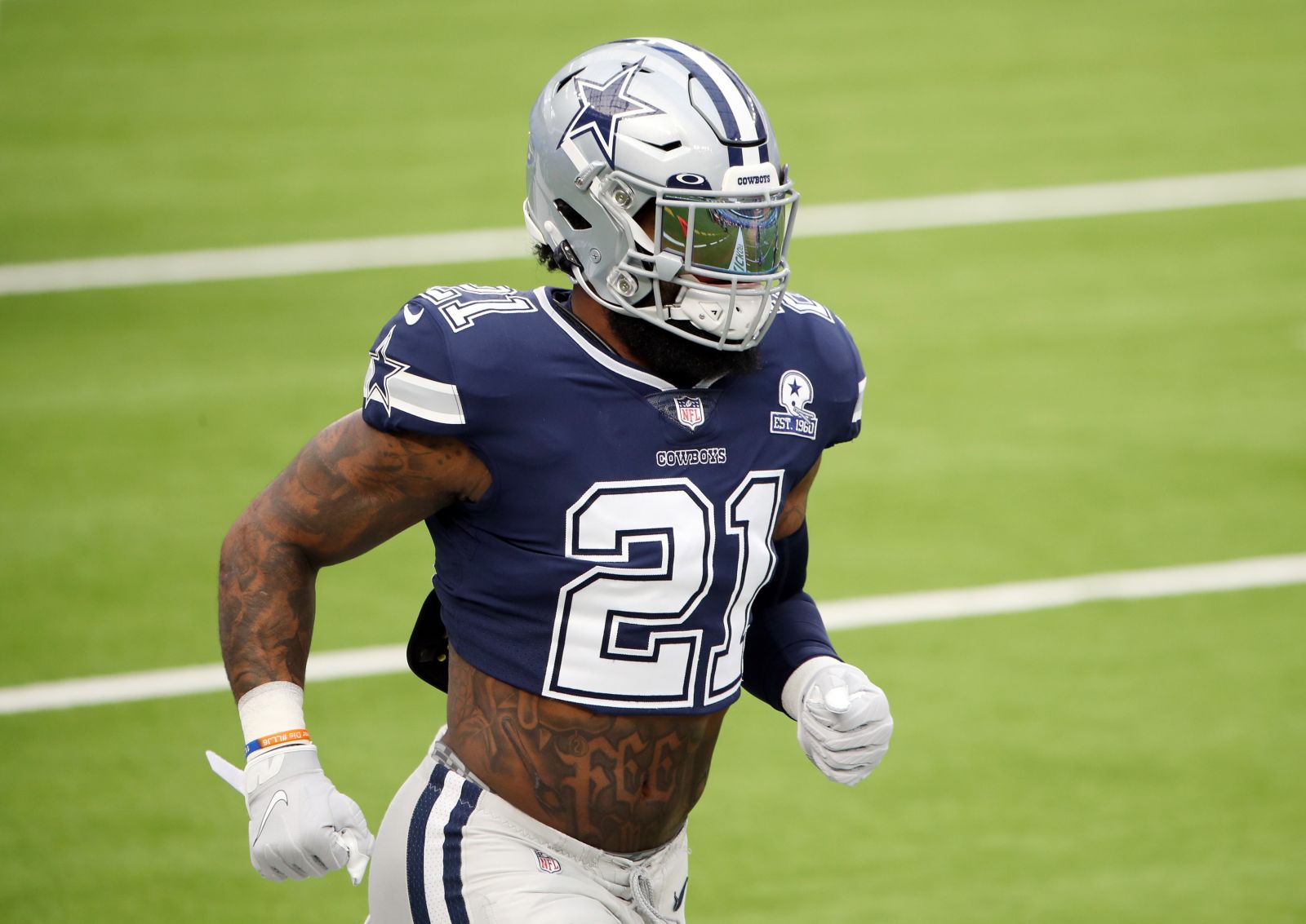 Ezekiel Elliott's Stomach Tattoos