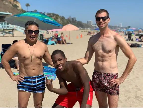 Alec Mapa enjoying the vacation with his husband and son