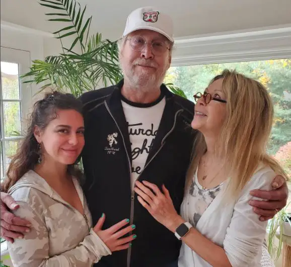 Chevy Chase alongside his daughter and wife after his weight loss