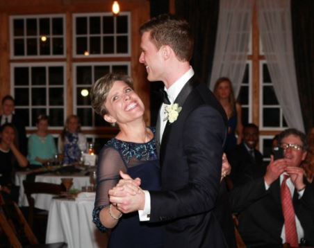 Harrison dancing with his mother in an event