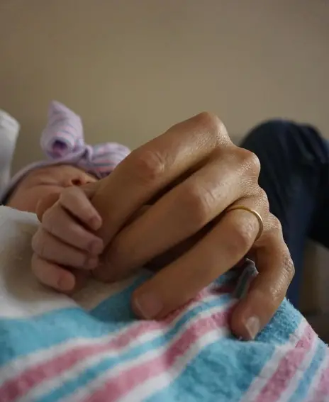 Jacob Soboroff And His Wife Holding Their Daughters Hand