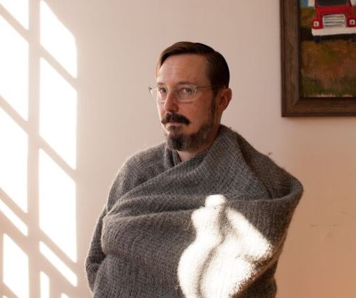 John Hodgman on a magazine photoshoot 