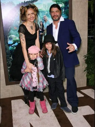Robert Trujillo alongside his wife, son and daughter