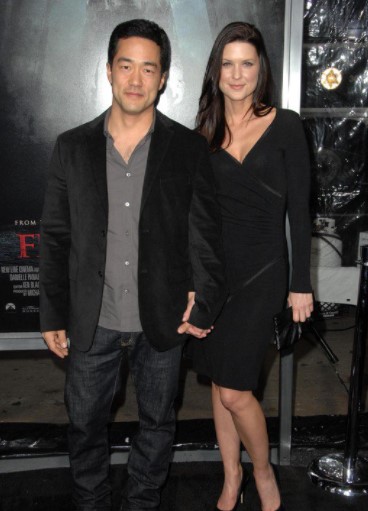 Tim Kang with His Wife During an Event