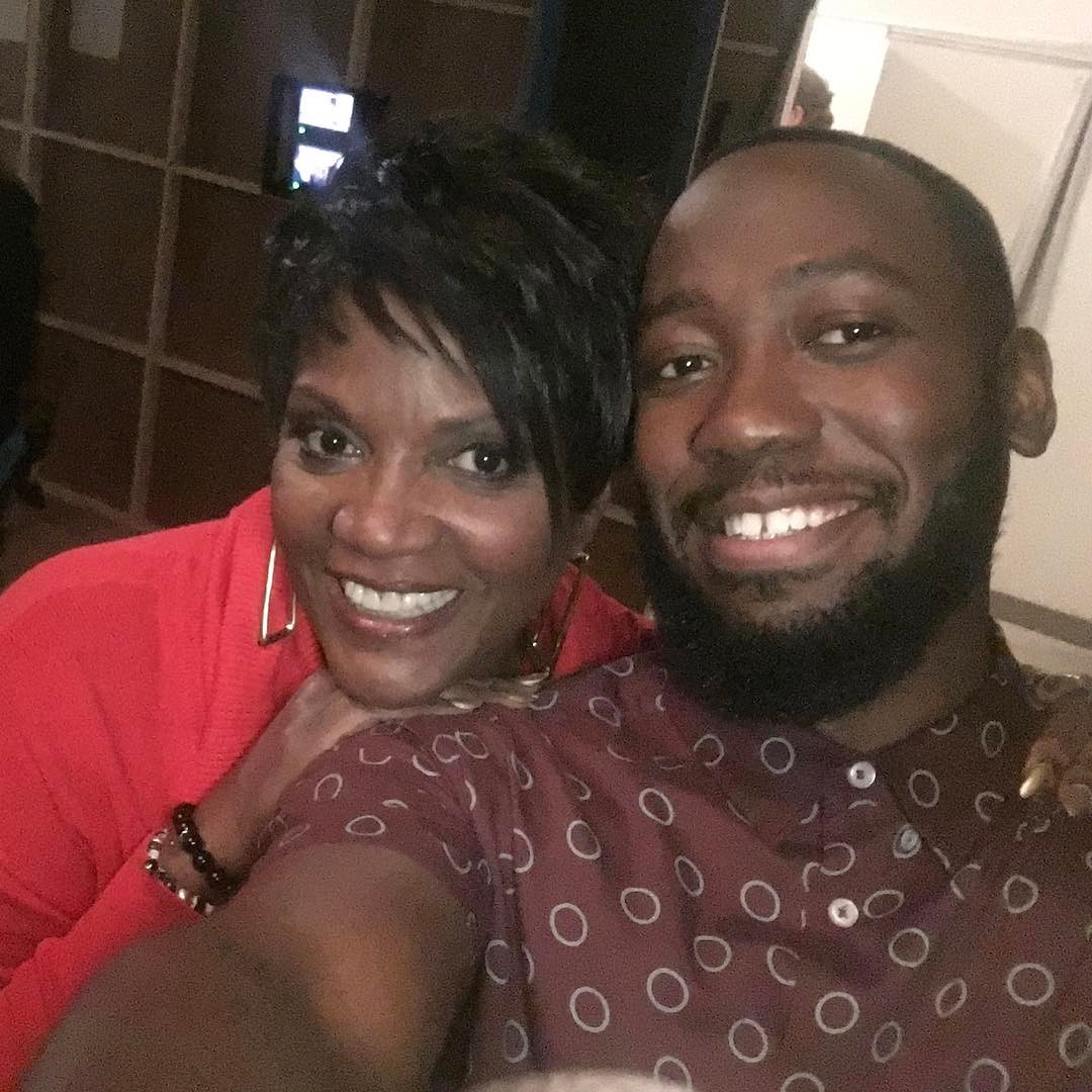 Anna Maria Horsford posing with her on-screen son 