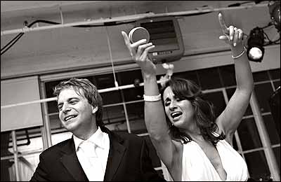 AudreyÂ PuenteÂ with husband Jay Thompson dancing to the rhythm in their New York wedding.