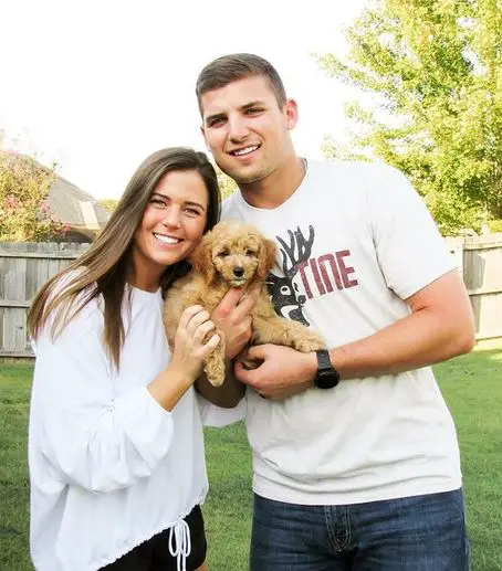 Austin Riley with his wife and his fur-baby, Luna