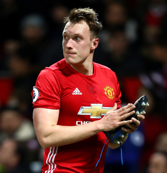 Phil Jones-The Man With Many Faces Celebrates Europa League After Successful Injury Comeback