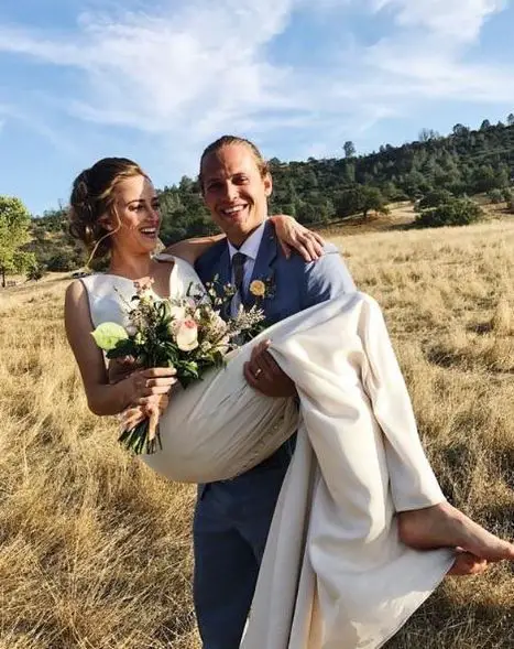Wyatt Nash carries his wife Aubrey Swander on their wedding dayÃ‚Â  17th September 2017