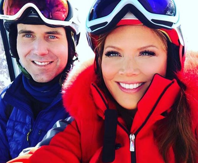 Trish Regan and her husband, James Ben smiling for a selfie while on vacati...