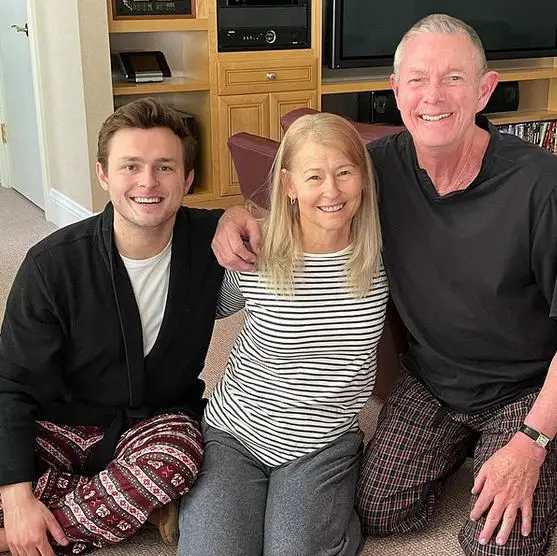 Collin Paul Carpenter with his dad, Richard Carpenter, and his mom, Mary Carpenter on Christmas of 2020. 