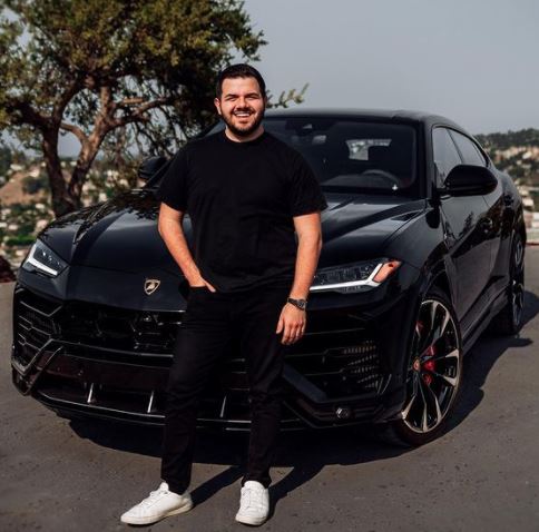 Jack posing with his dream car, Lamborghini Urus 