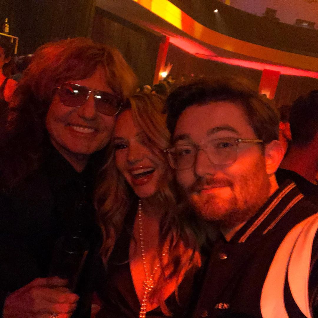 Monochrome picture of David Coverdale with his wife, Cindy, and son, Jasper