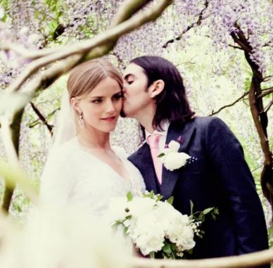 Dhani Harrison and his wife posing for their wedding photoshoot