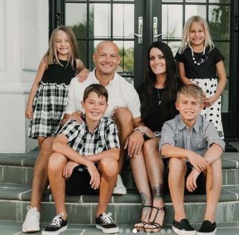 Family portrait of P.J. Fleck with his wife and kids