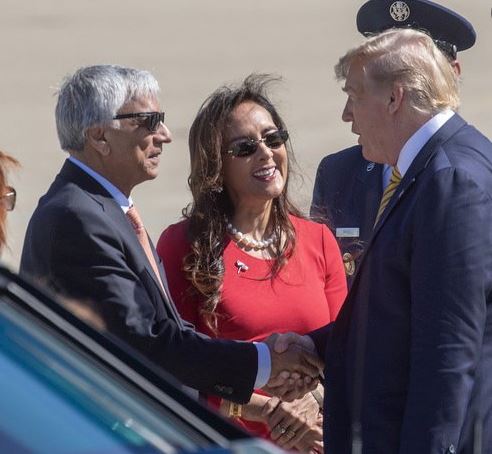 Harmeet Dhillon and her husband greet former President Trump