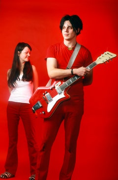 Jack and Meg White posing for their band portrait