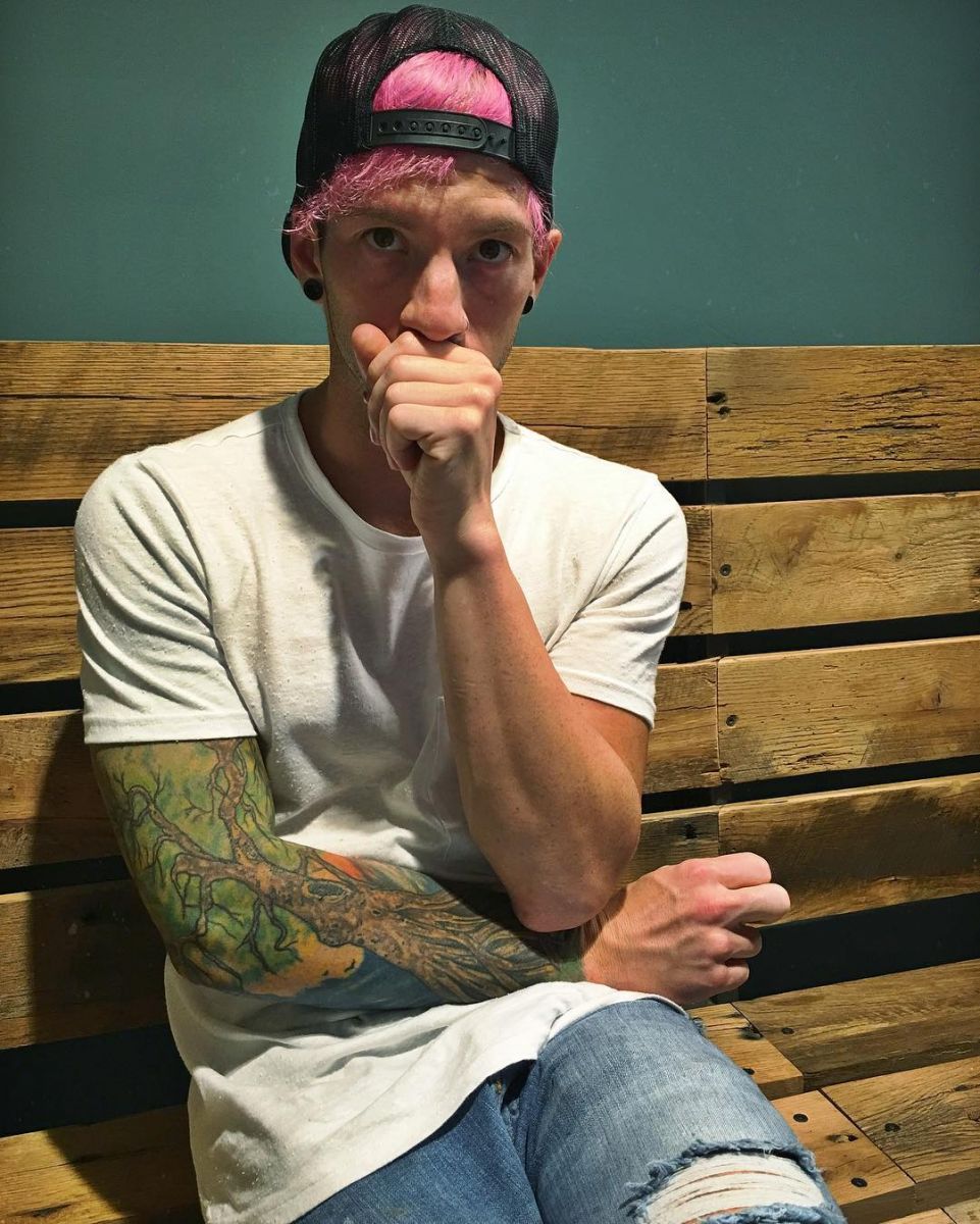 Josh Dun tattooed arm on display