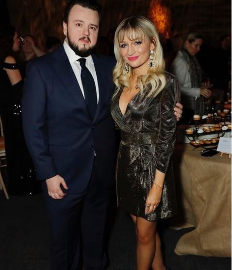 John Bradley with his girlfriend