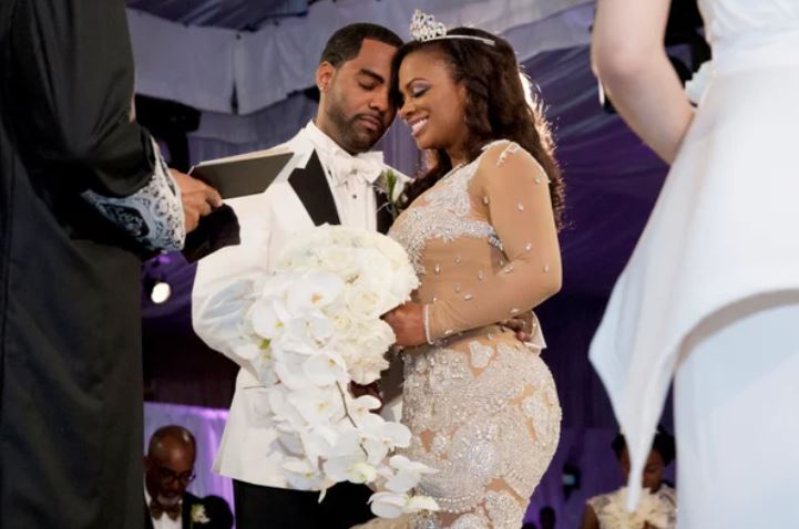 Kandi with her husband on their wedding day