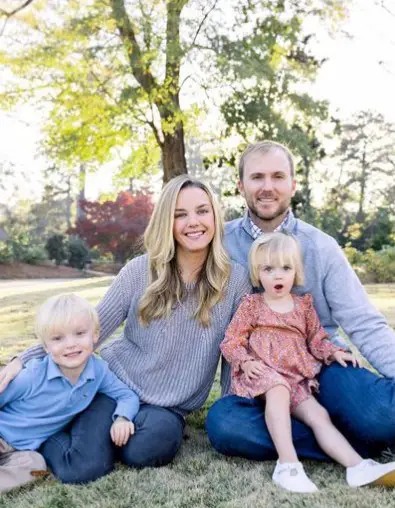 Russell Henley with his wife and family