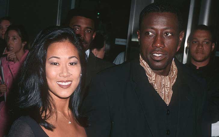 Wesley Snipes with His Wife During an Event
