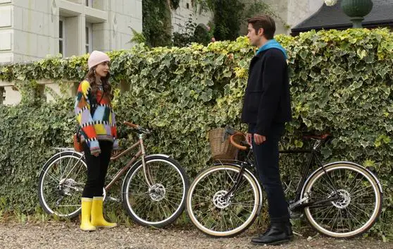 Lily Collins and Lucas Bravo in a scene from Emily in Paris