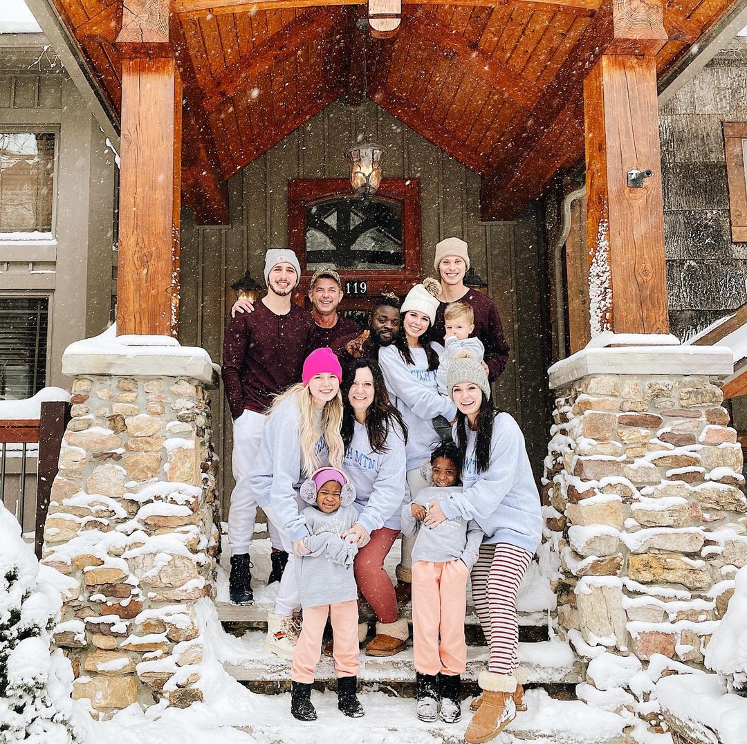 Lysa TerKeurst's family picture with her husband, Art, daughters, sons, and grandchildren