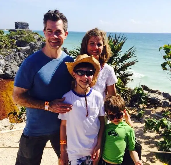 Natalie Morales with her husband and two kids during a vacation