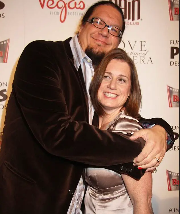 Penn Jillette and his wife pictured at an event