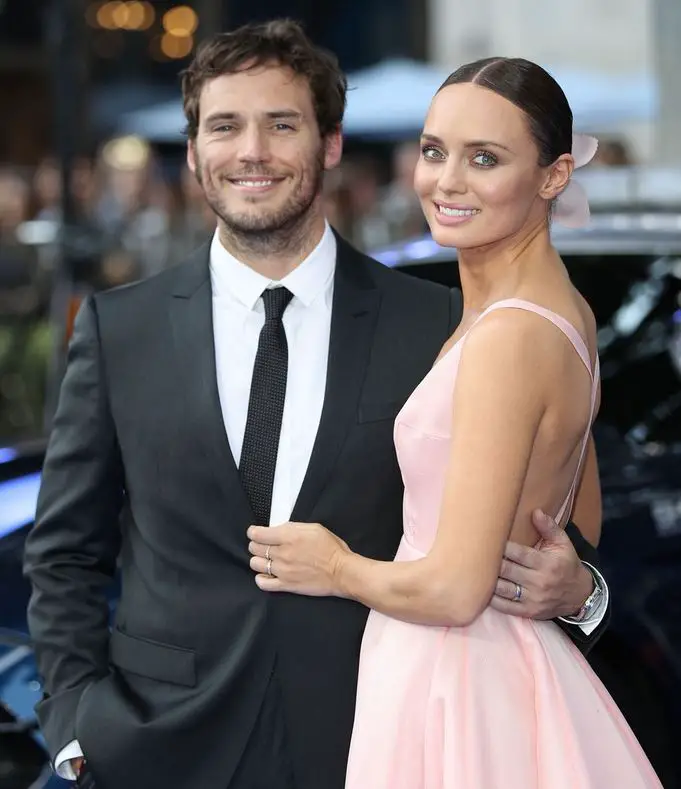 Sam Claflin at an event posing with his former wife