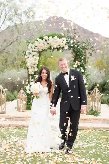 Scott and his wife posing as a bride and groom