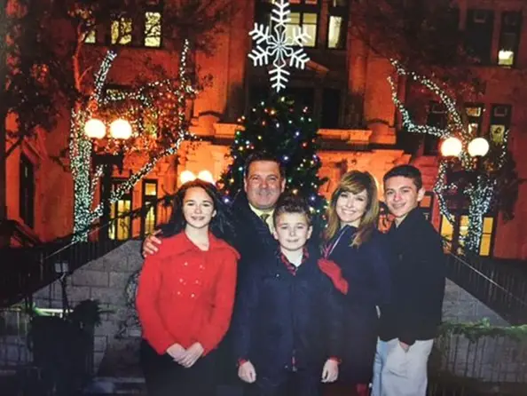 Mary Calvi's holiday picture with her husband and children