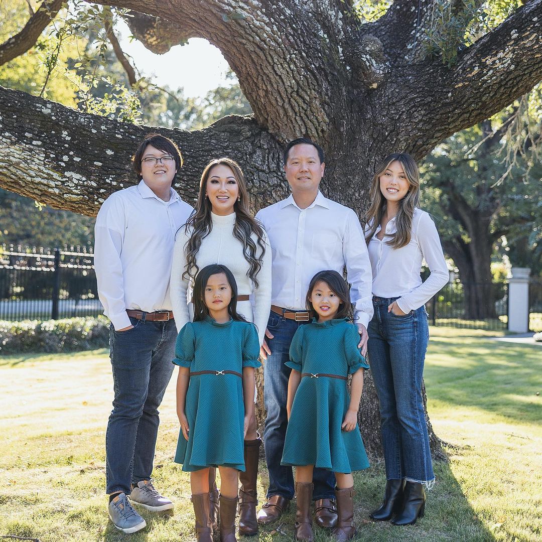 Tiffany Moon's family portrait with her husband and kids