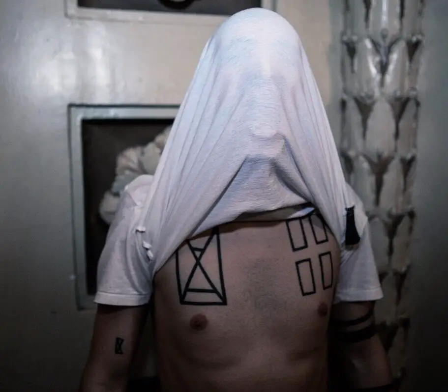 Tyler Joseph's chest tattoos on display