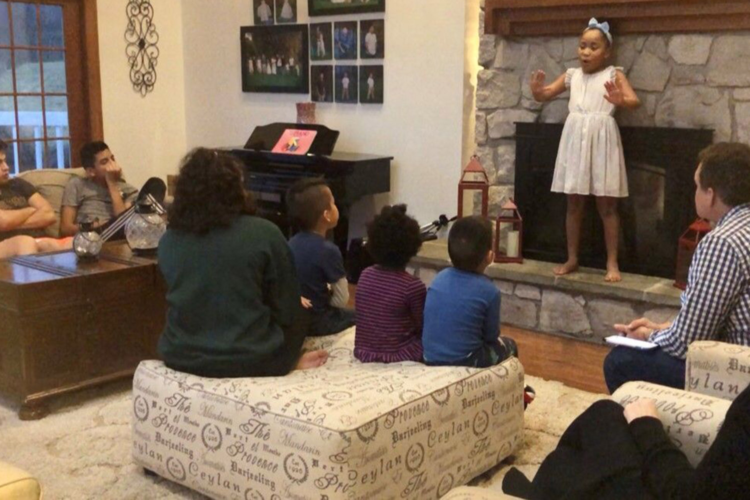 Victory Brinker performing in front of her parents and siblings as a child 