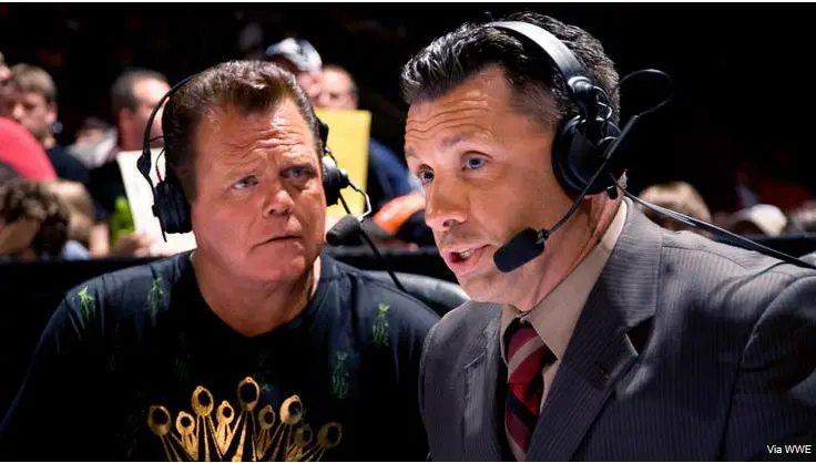 Michael Cole (right) on his commentary duties in WWE alongside Jerry Lawler